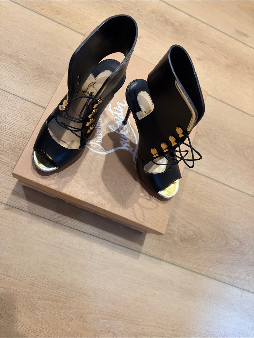 Christian Louboutin Black and Gold Open-Toe Lace-Up Booties
